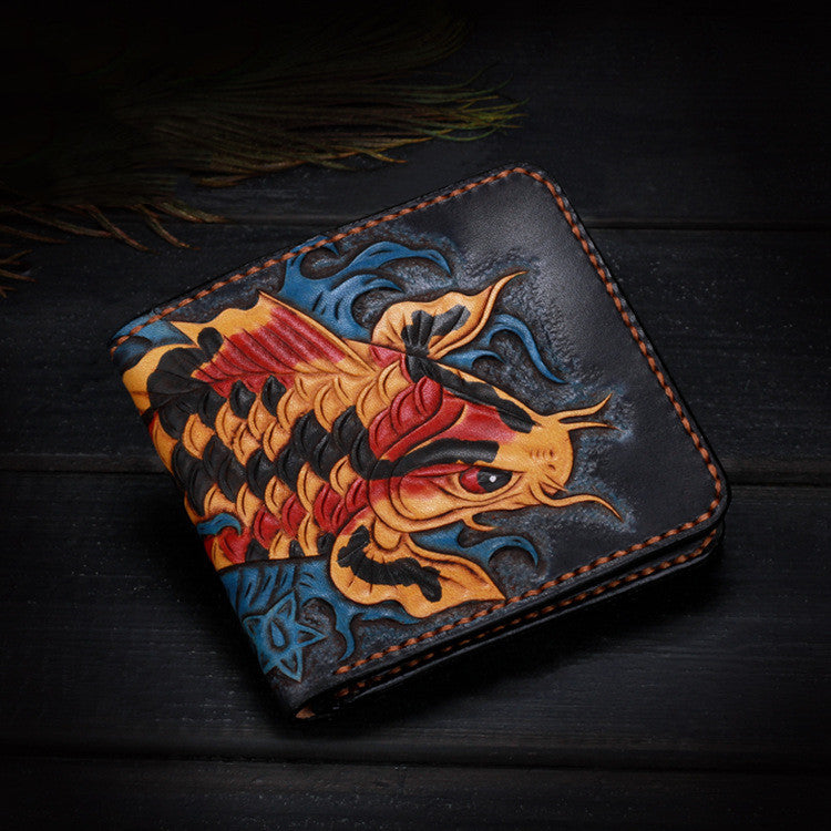 Leather wallet with dragon design on a dark wooden surface