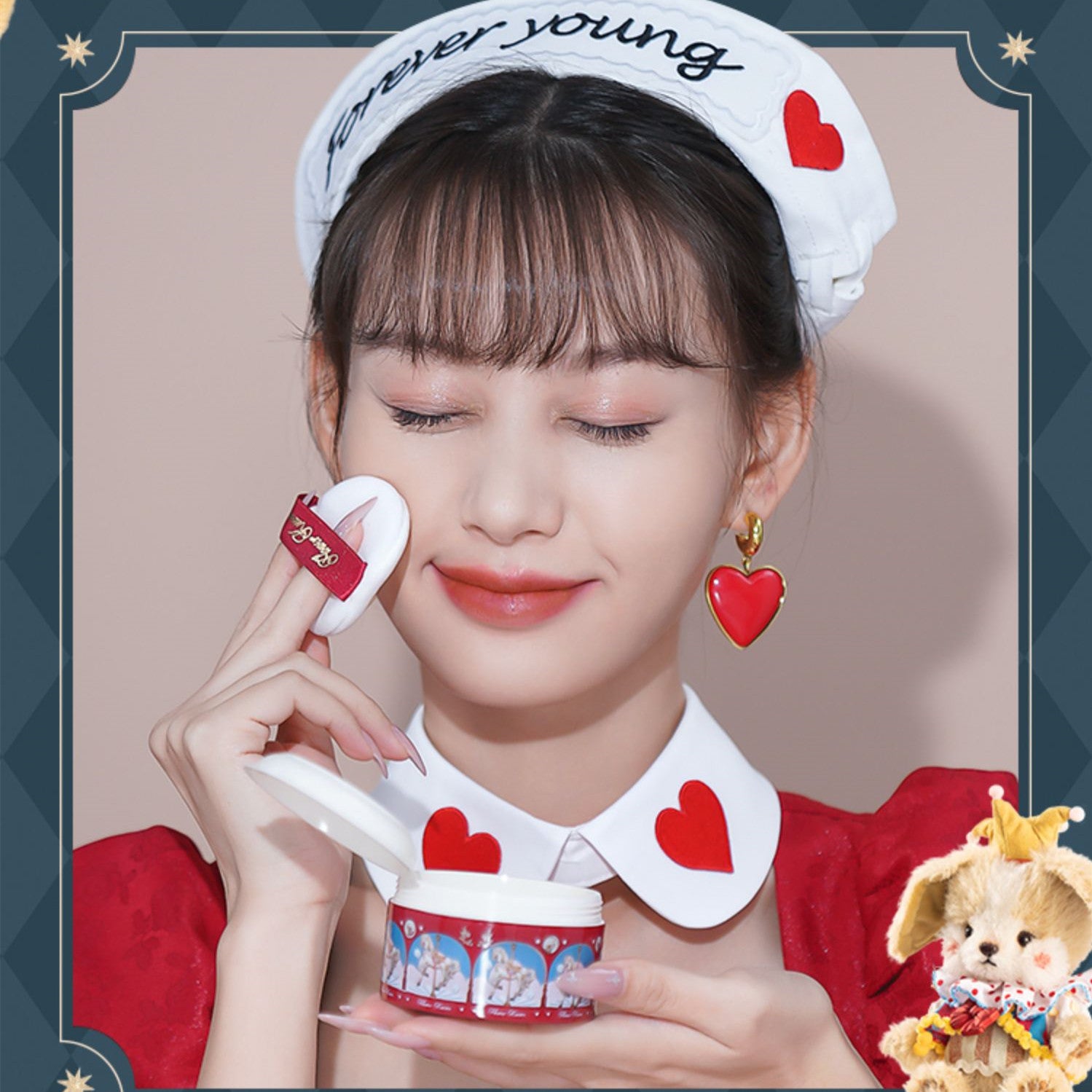 Woman wearing a headband with heart shapes, holding a cosmetic product, and a teddy bear in the corner.