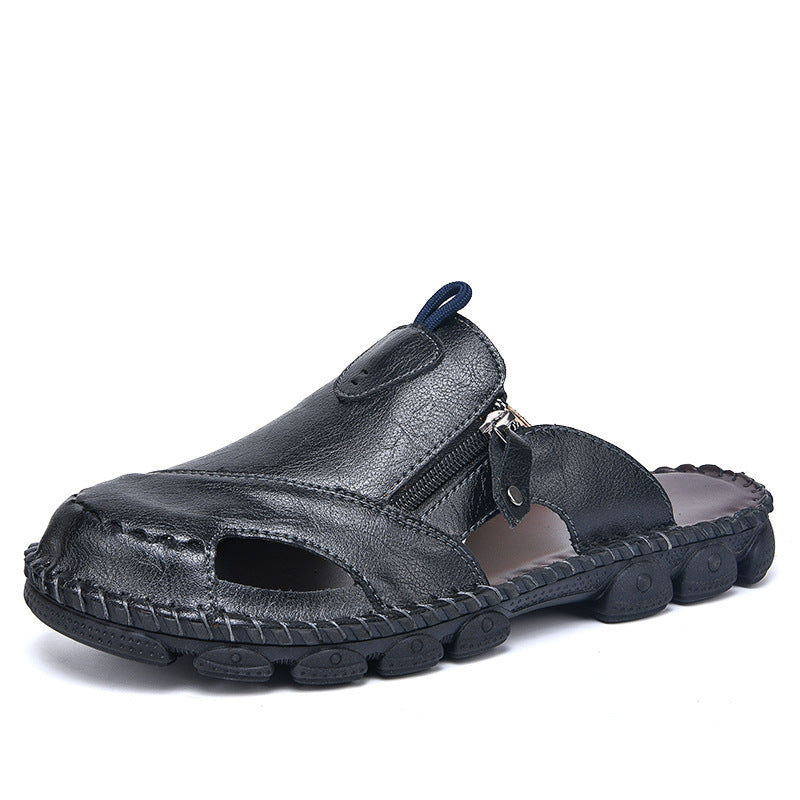 Black sandal with a zipper on a white background