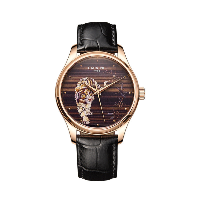 Luxury watch with tiger design on the dial against a white background
