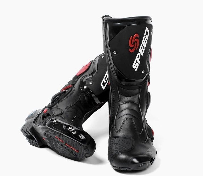 Black motorcycle boots with 'Speed' branding on a white background