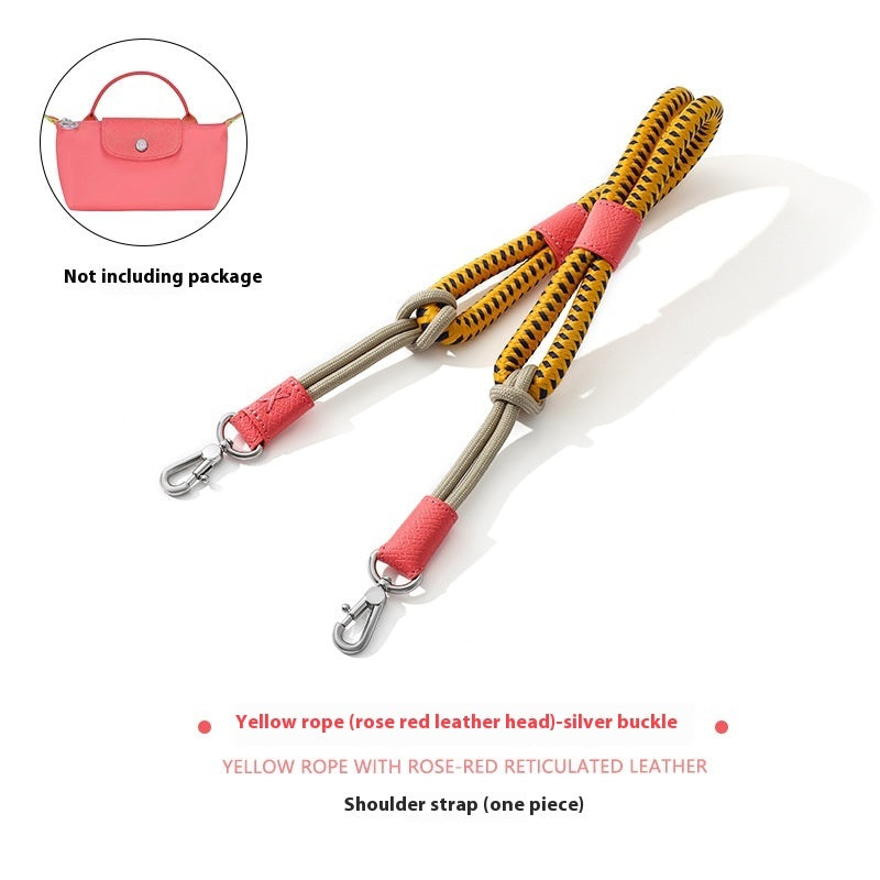 Shoulder strap with yellow rope and rose red leather accents on a white background