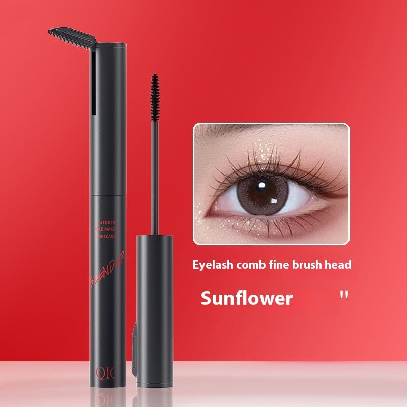 Eyelash comb with fine brush head on a red background, showing an eye with added eyelashes.