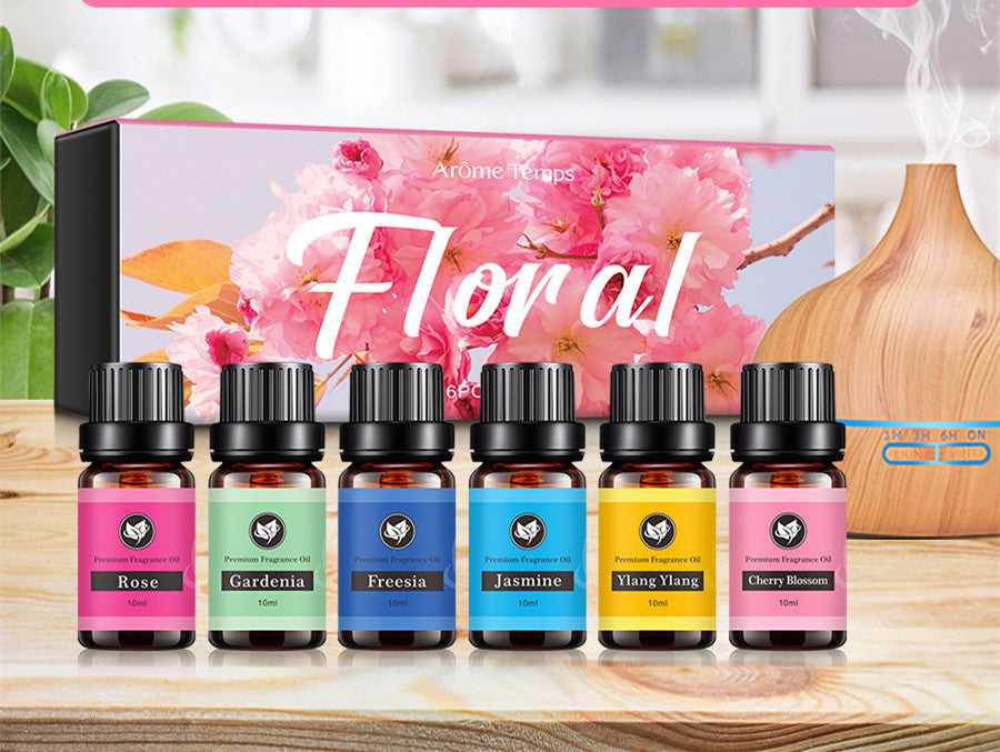 16 Theme Atmosphere Flameless Essential Oil Sets featuring rose, gardenia, freesia, jasmine, ylang ylang, and cherry blossom scents.