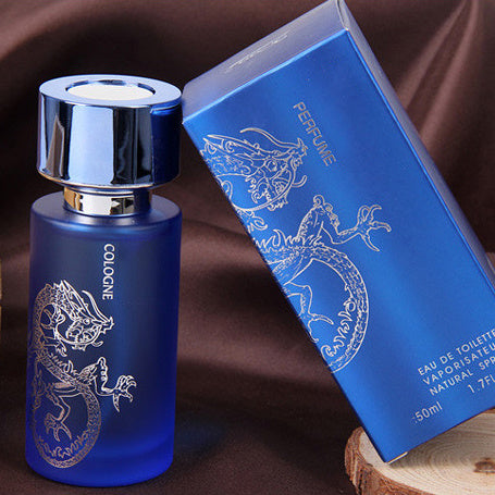 Blue cologne bottle and packaging with lizard design on a brown background