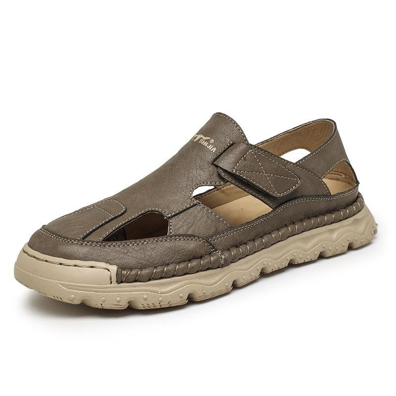 Brown sandal with a visible brand logo on a white background