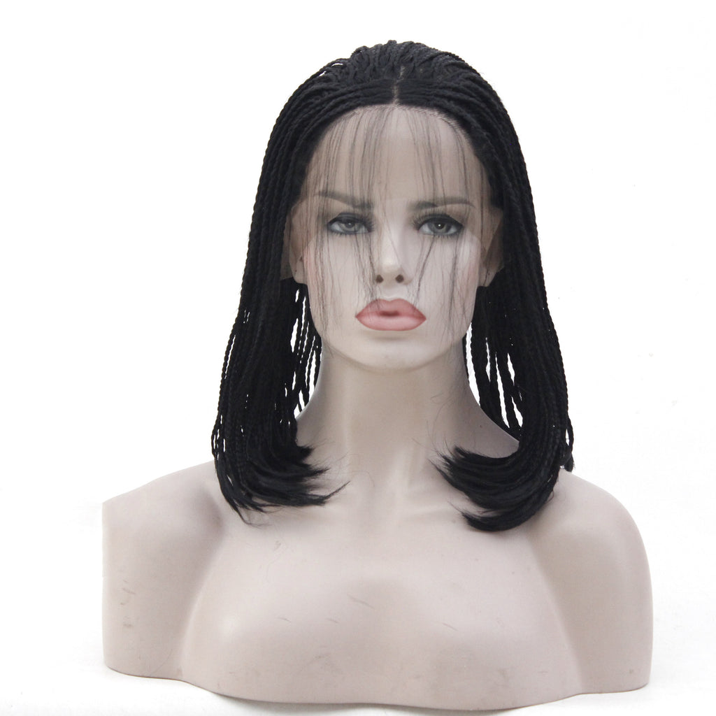 Black braided wig on a mannequin head against a white background