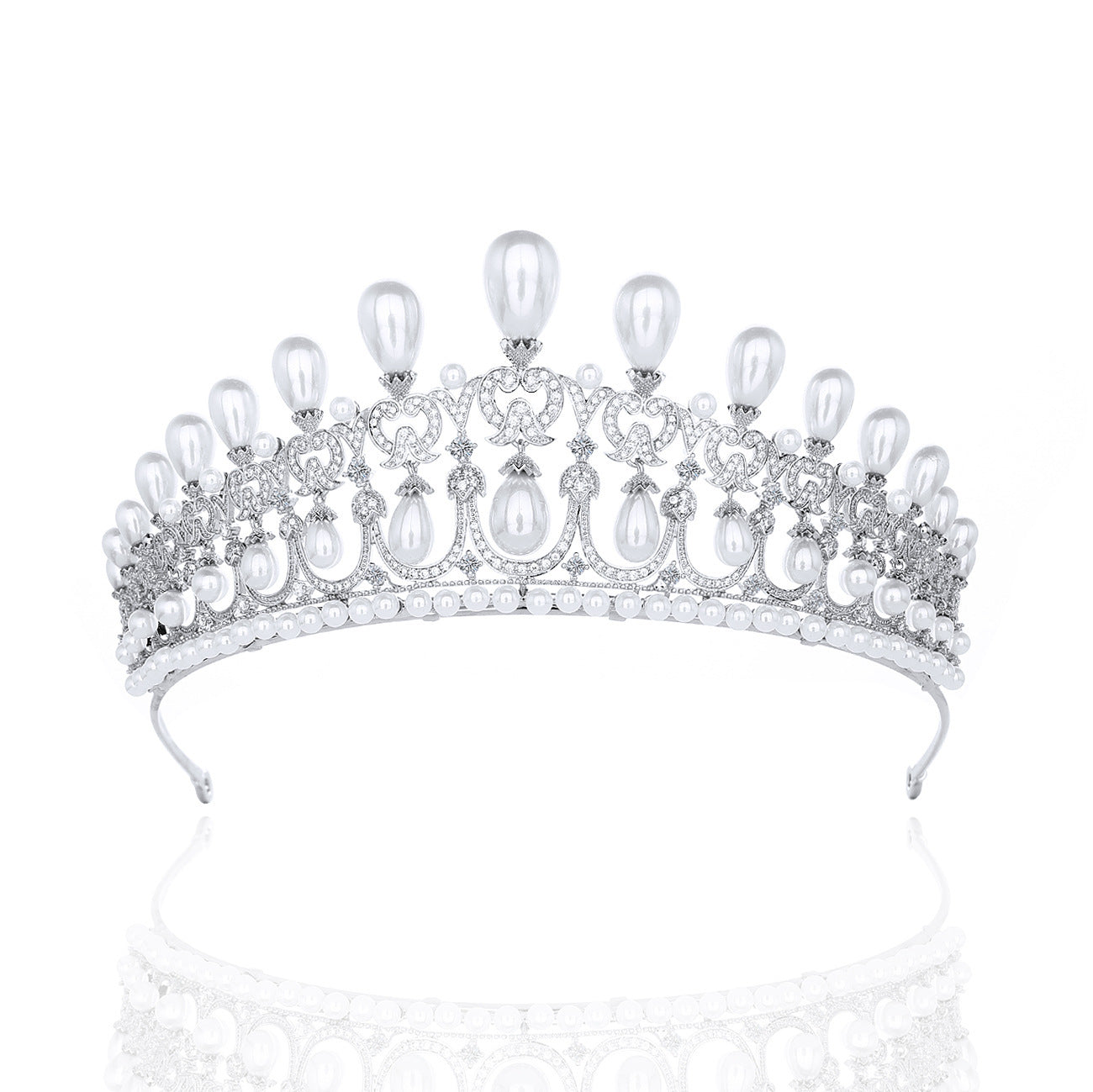 Silver tiara with pearls on a white background