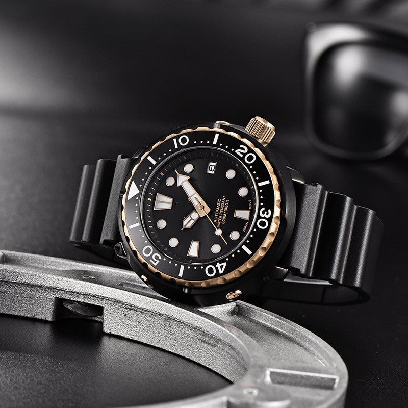 Black and gold watch with a detailed face on a dark background