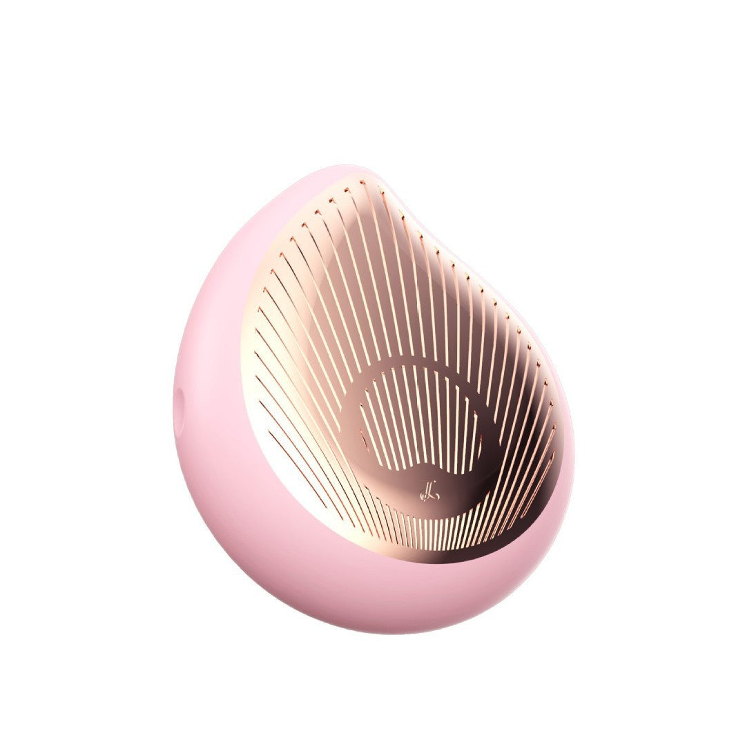 Pink and rose gold electronic device on a white background