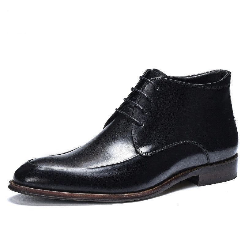 Black leather dress shoe on a white background