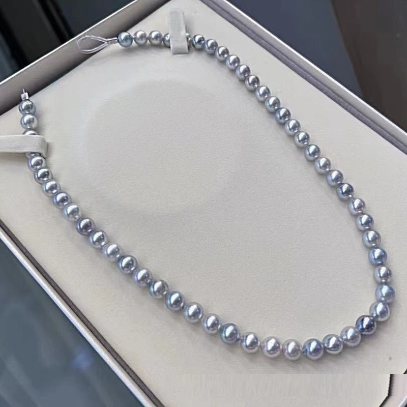 Pearl necklace on a white box