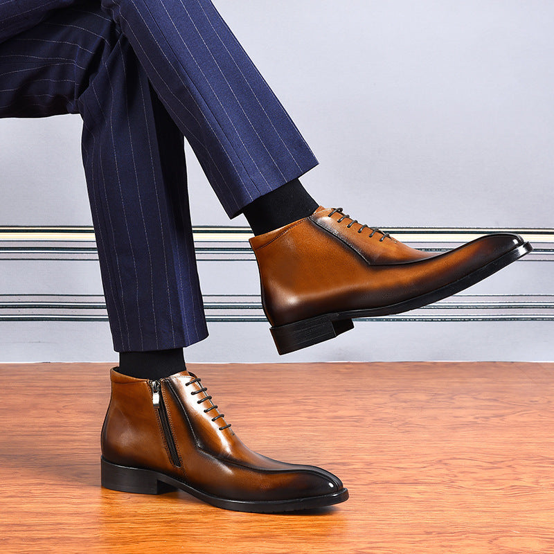 Brown dress shoes with blue pinstripe pants on a wooden floor.