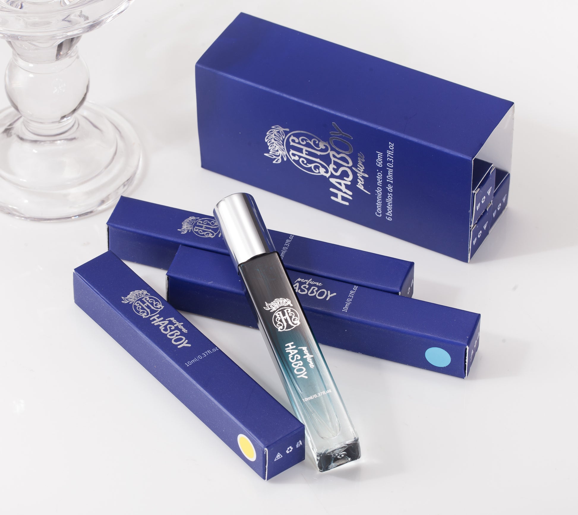 Blue Hasbrouck perfume bottle and packaging on a white background