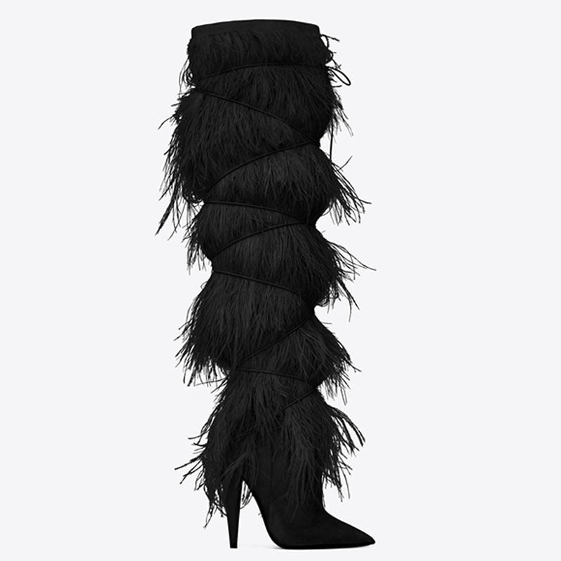 Black feathered knee-high boot on a white background
