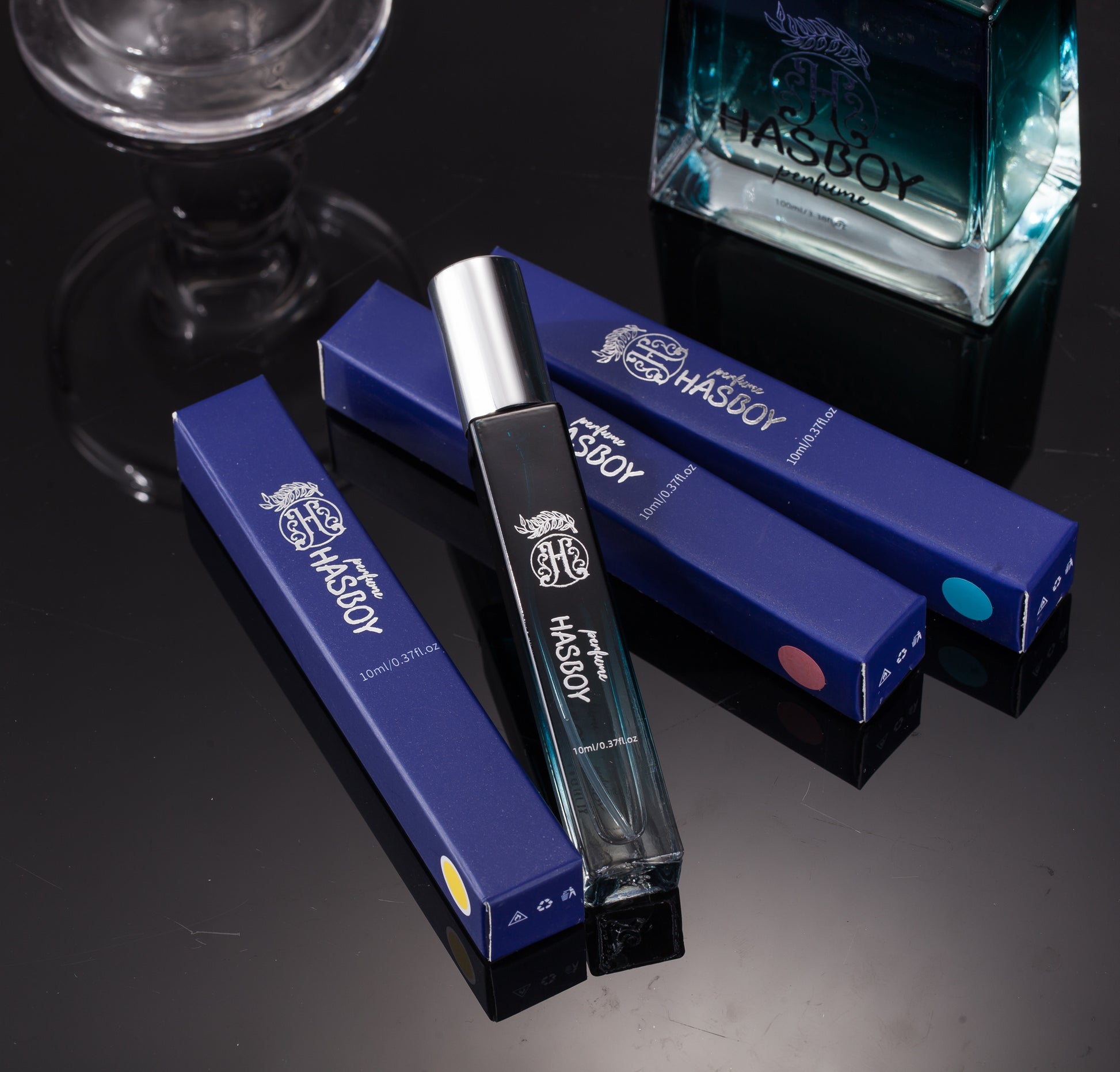 HASBOY vape device and packaging on a reflective surface