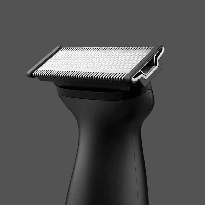 Black electronic device with a textured panel and HDMI connector on a gray background