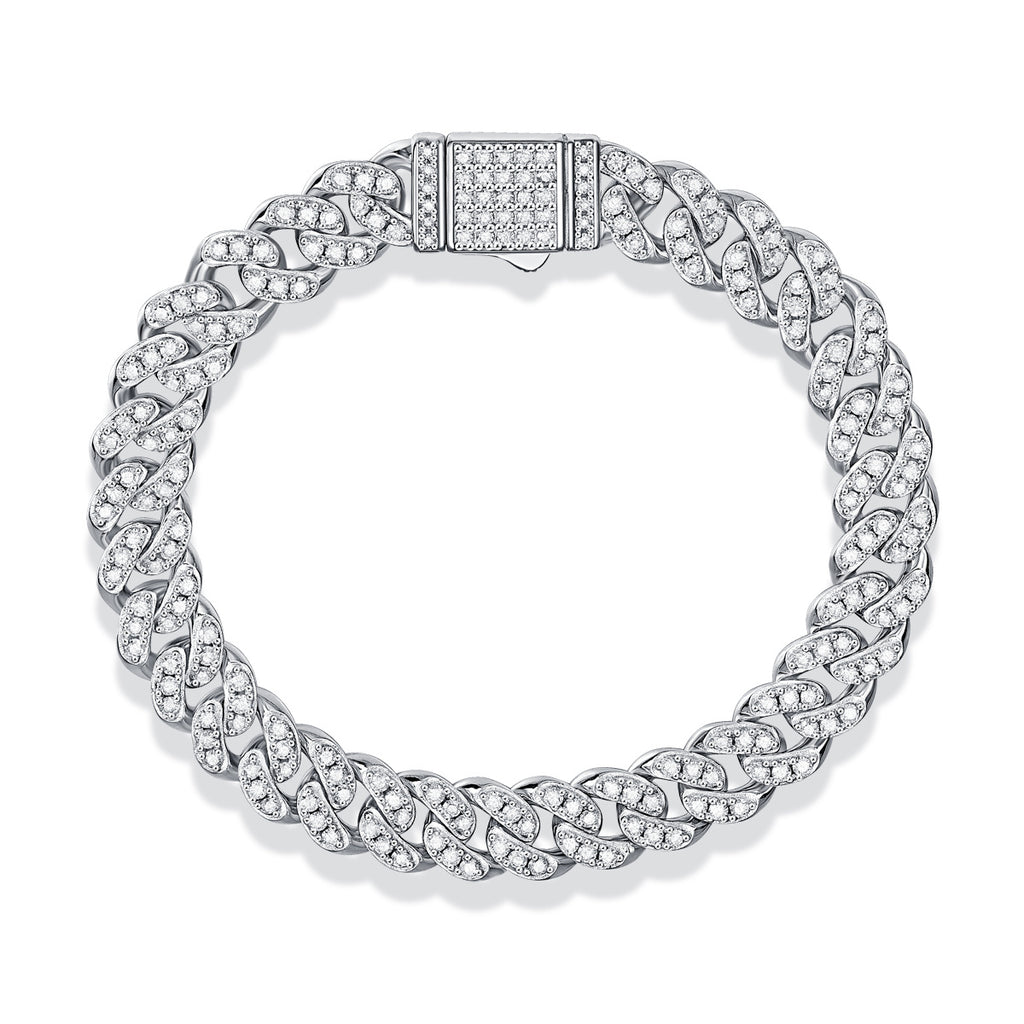 Silver bracelet with intricate design on a white background