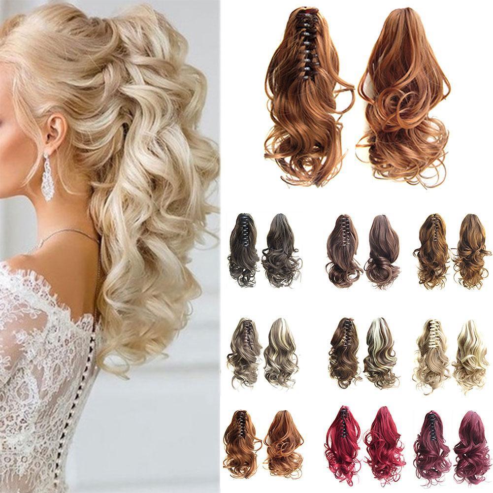 Blonde hair extension on a model with additional hair extensions displayed in various colors.