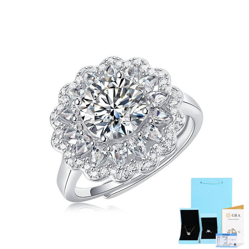 Silver ring with diamond-like stones on a white background