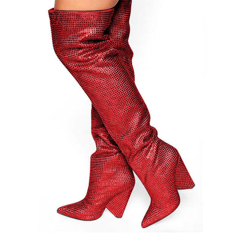 Red textured knee-high boots on a white background