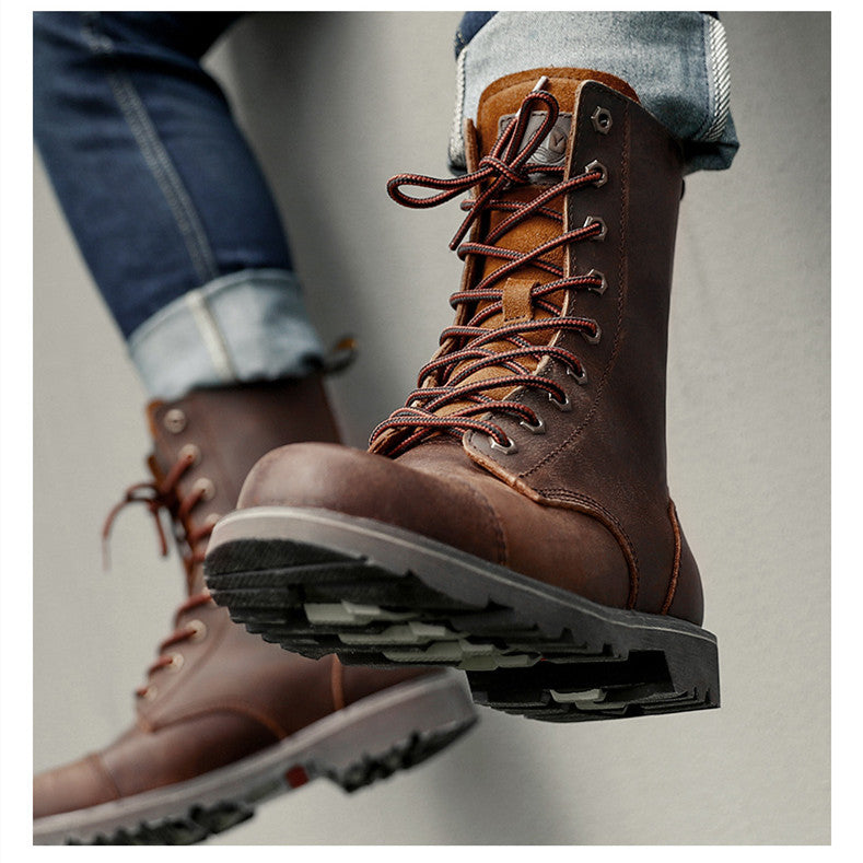 Brown leather boots with laces worn by a person on a neutral background