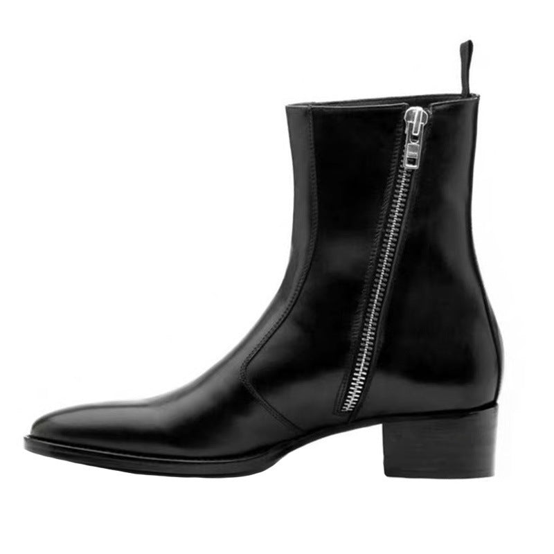 Black ankle boot with a zipper on a white background