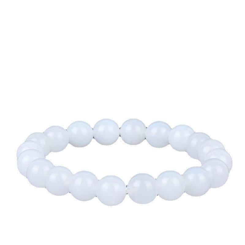 White beaded bracelet on a white background