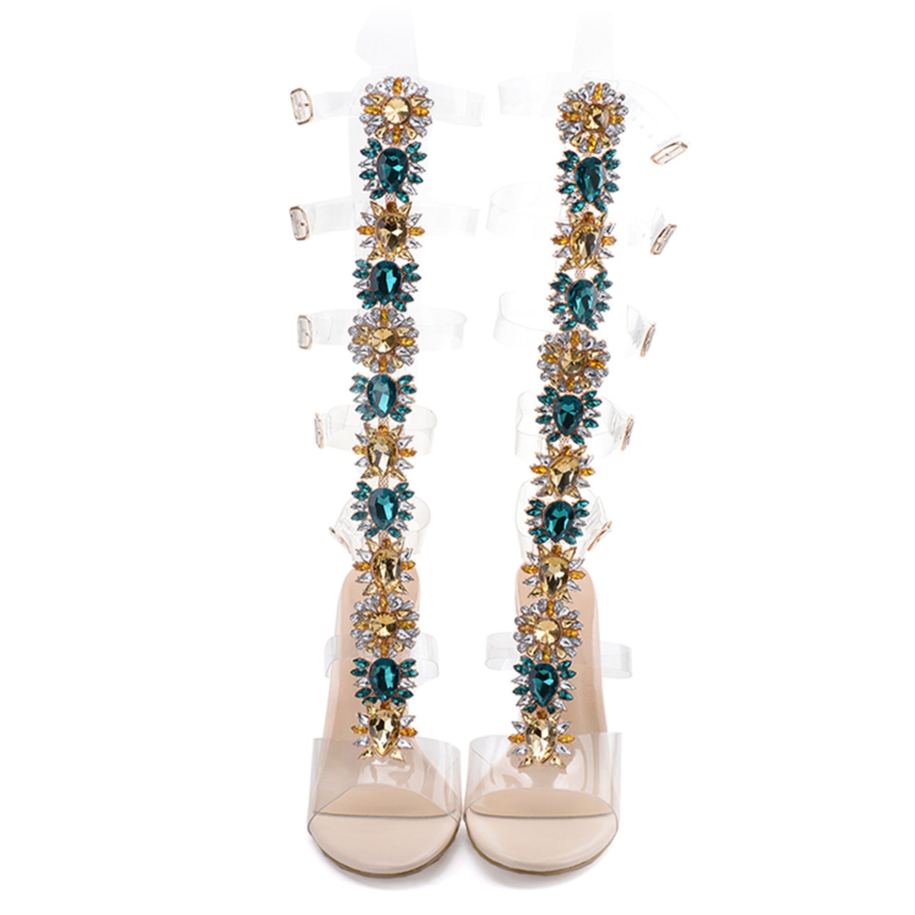 Beige high-heeled shoes with decorative multicolored embellishments on a white background