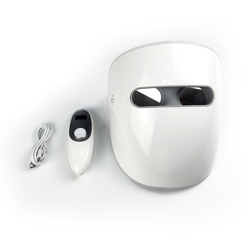 White electronic device with a remote control on a white background