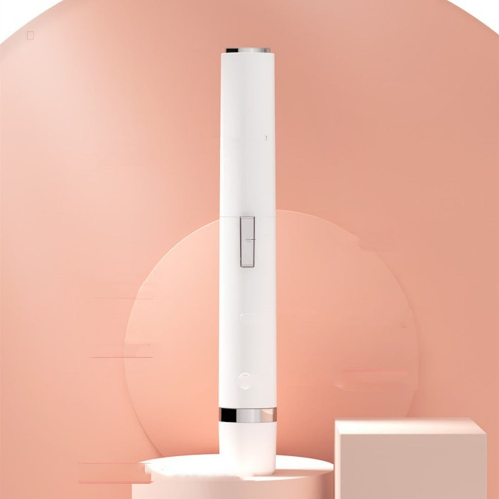 White electronic device on a pink geometric background