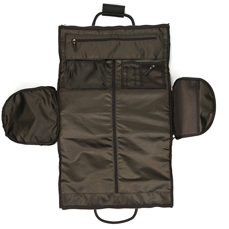 Brown garment bag with open compartments on a white background