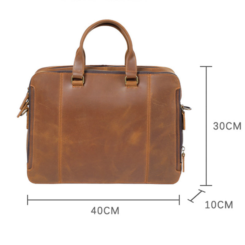Brown leather briefcase with dimensions indicated on a white background