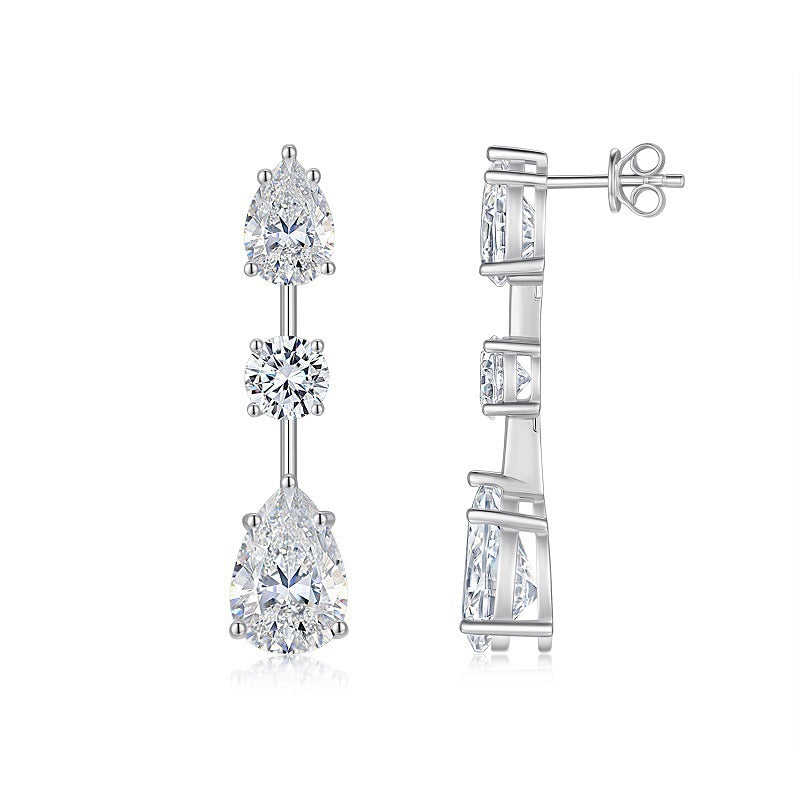 Pair of diamond earrings on a white background