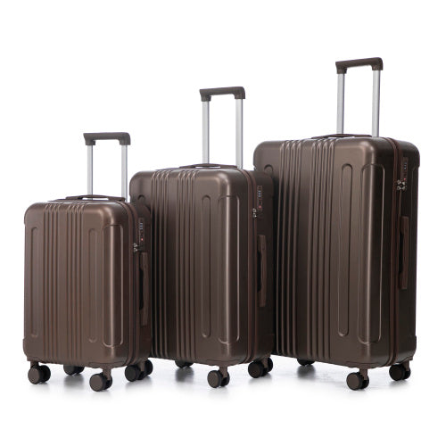 Set of four brown suitcases of different sizes on a white background