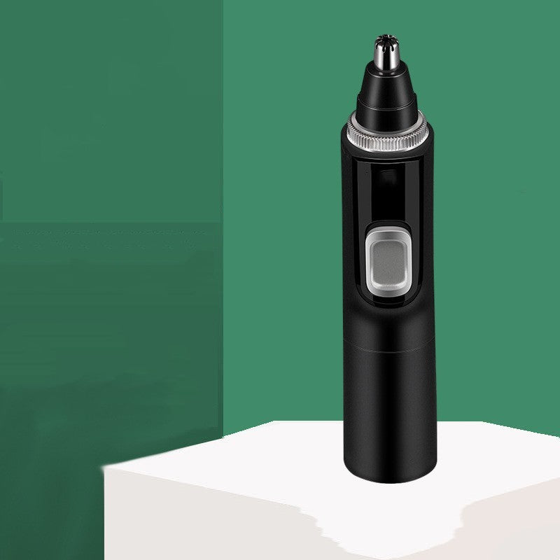 Black electric nose and ear hair trimmer on a green and white background