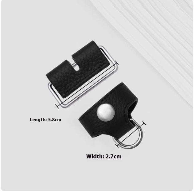 Black leather belt buckle with measurements on a white background