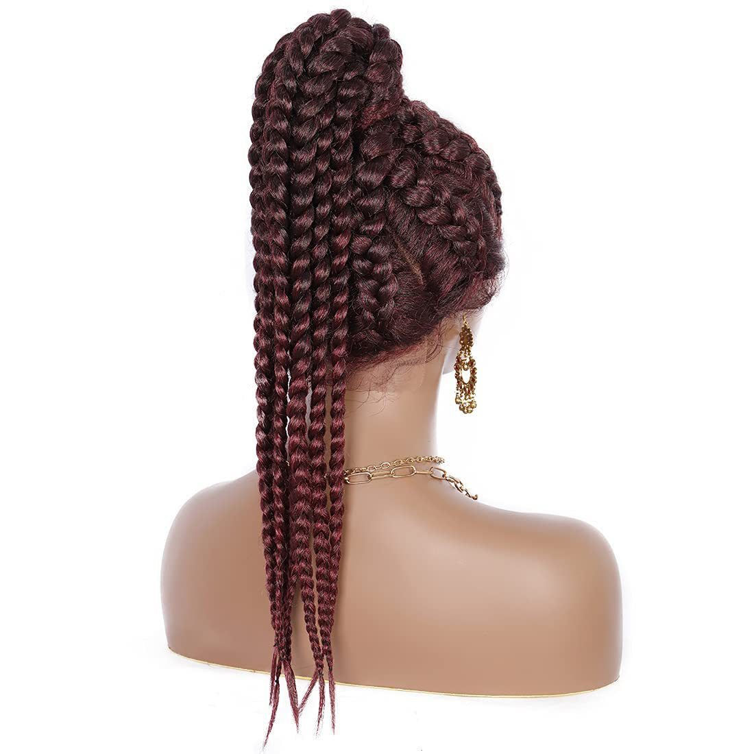 Mannequin head with braided hair styled in a bun on a white background