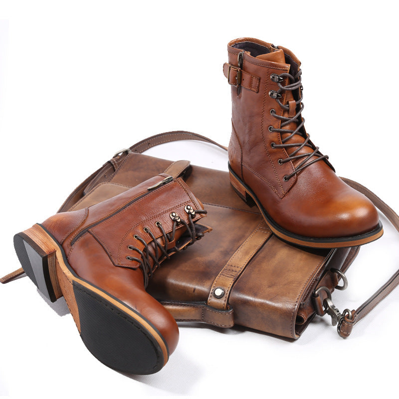 Brown leather boots and bag on a white background