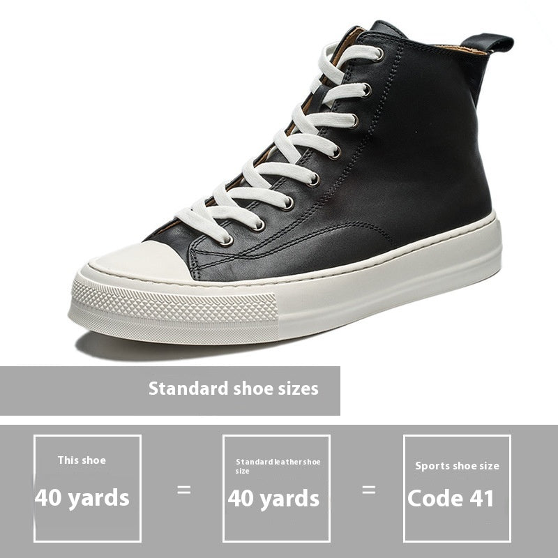 Black high-top sneaker with white laces on a light gray background