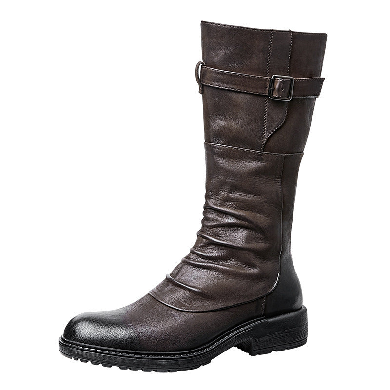 Brown leather boot with a buckle on a white background