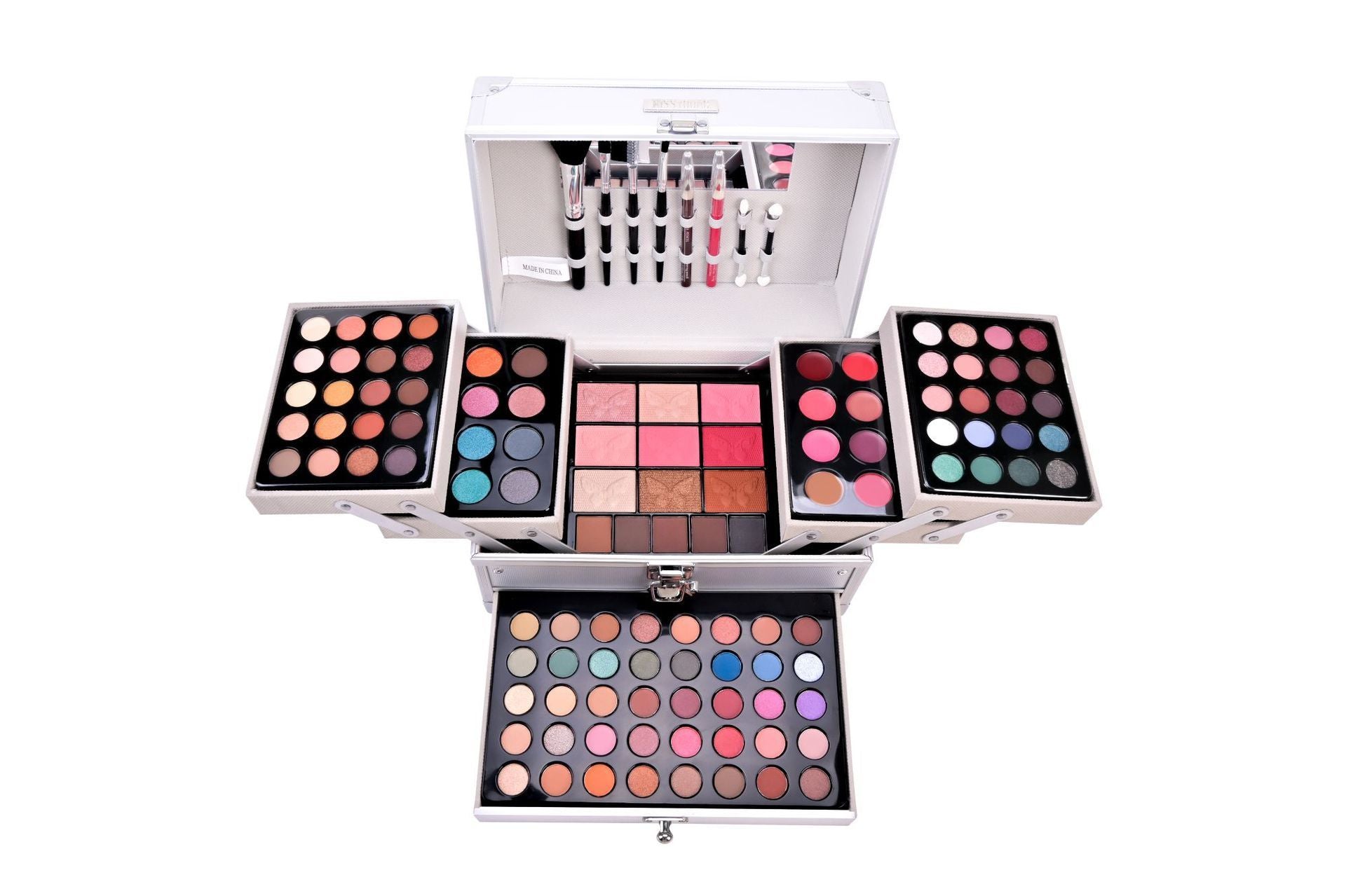 Makeup palette with various colors on a white background