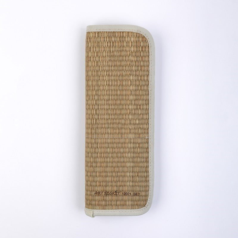 Woven leather wallet on a white background