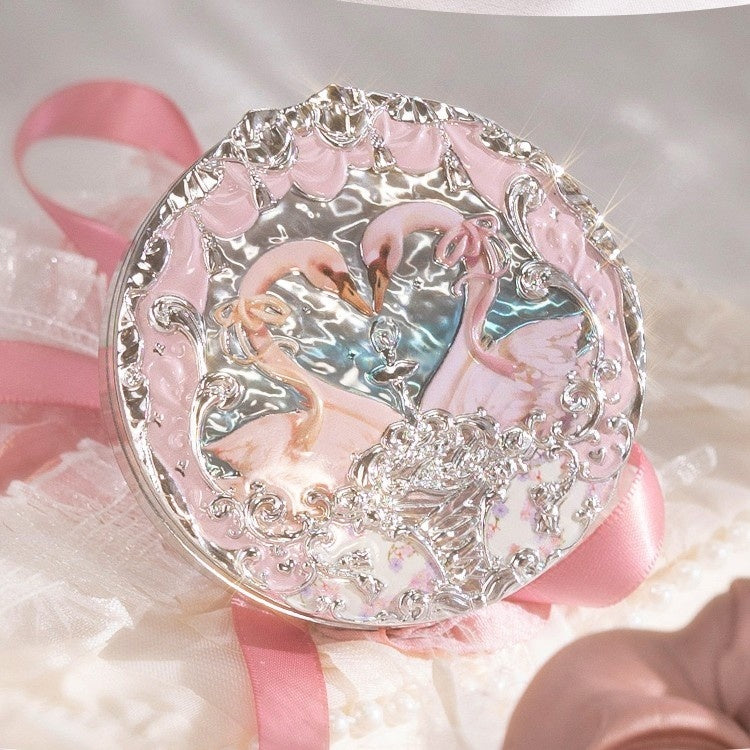 Decorative plate with flamingo design on a soft pink background