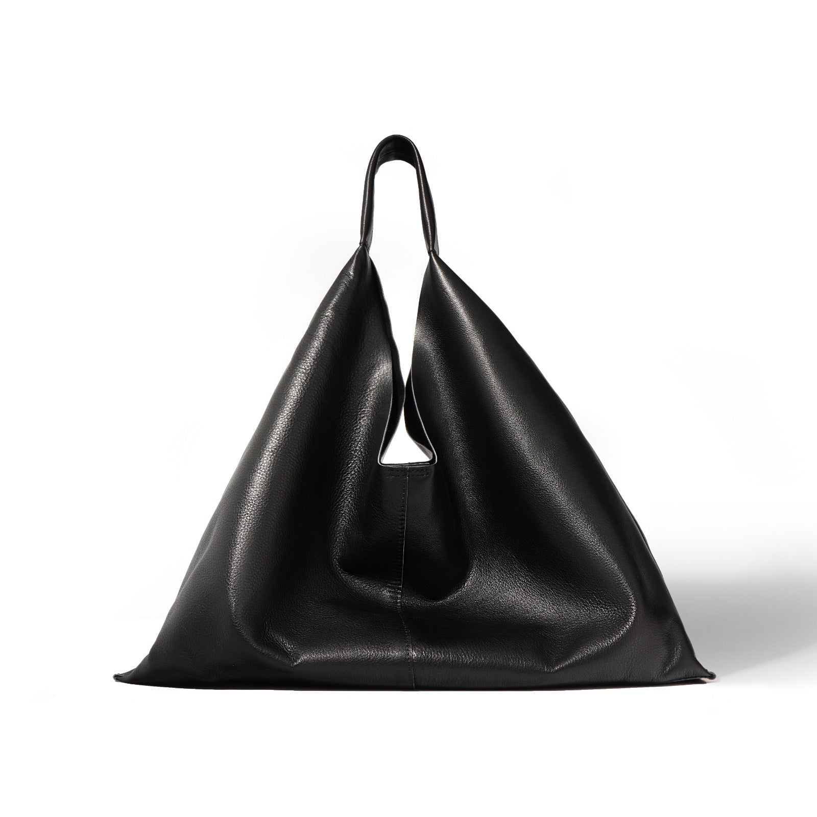Black leather handbag on a white background