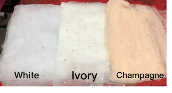 Three fabric swatches labeled 'White', 'Ivory', and 'Champagne' on a red background.
