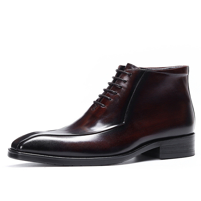 Brown leather dress shoe on a white background