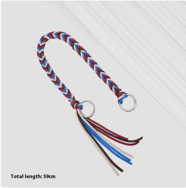 Colorful braided keychain with tassels on a white background
