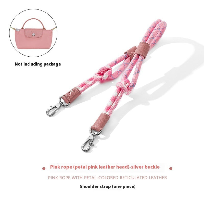 Pink rope shoulder strap with silver buckle on a white background
