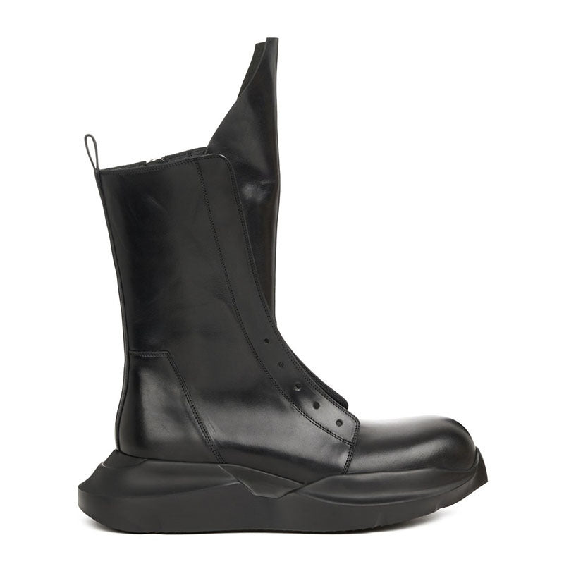 Black leather boot on a white background